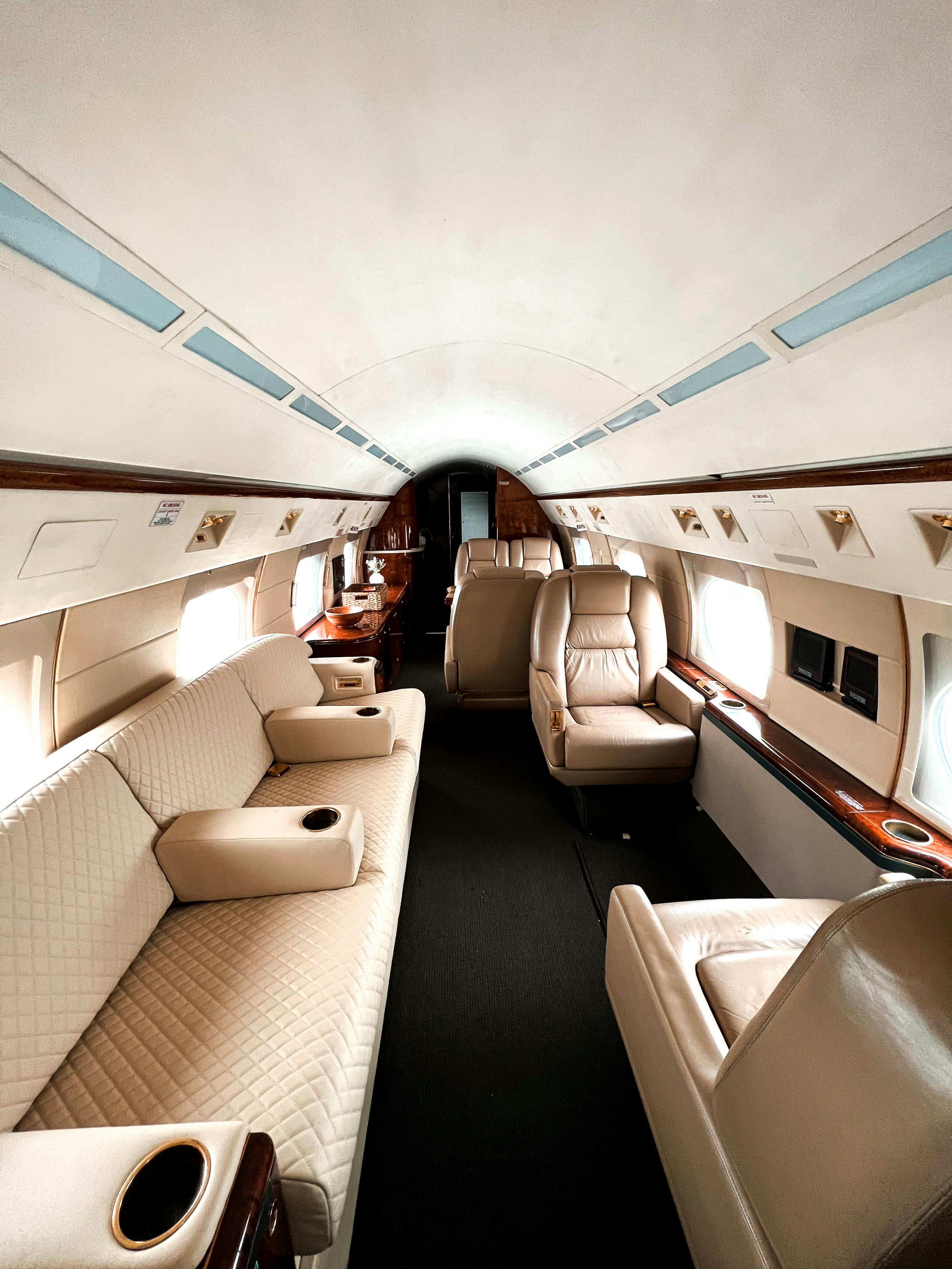 First class airline suite with lie-flat bed