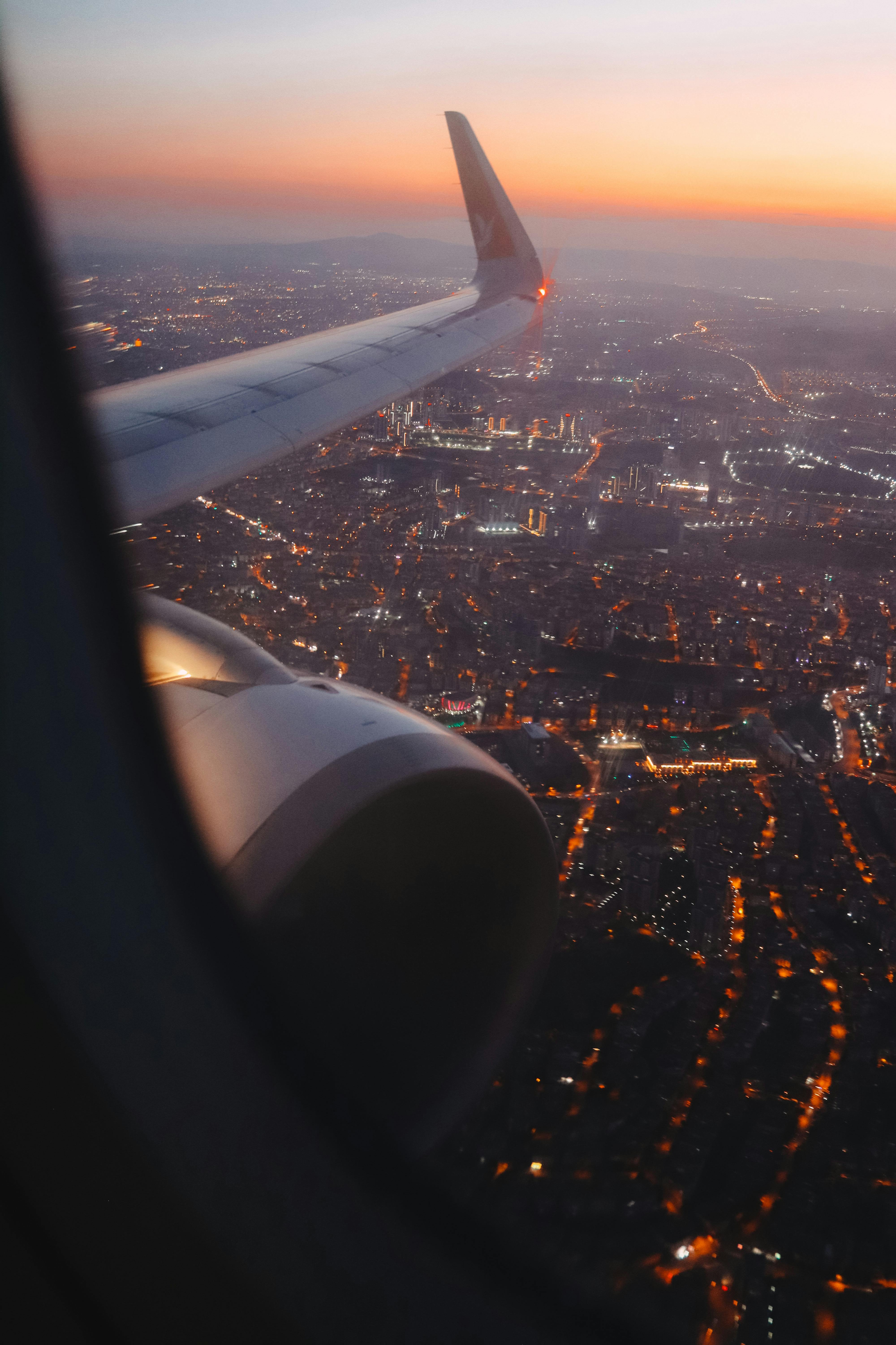 Sunrise view from airplane window seat